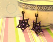 Goth hand beaded purple and black snowflake spiderweb dangle earrings