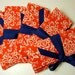 SALE Bridesmaid Clutches in Orange Crush damask with navy. Custom colors available.
