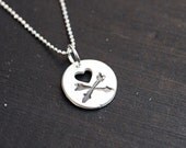 heart and cross arrows.