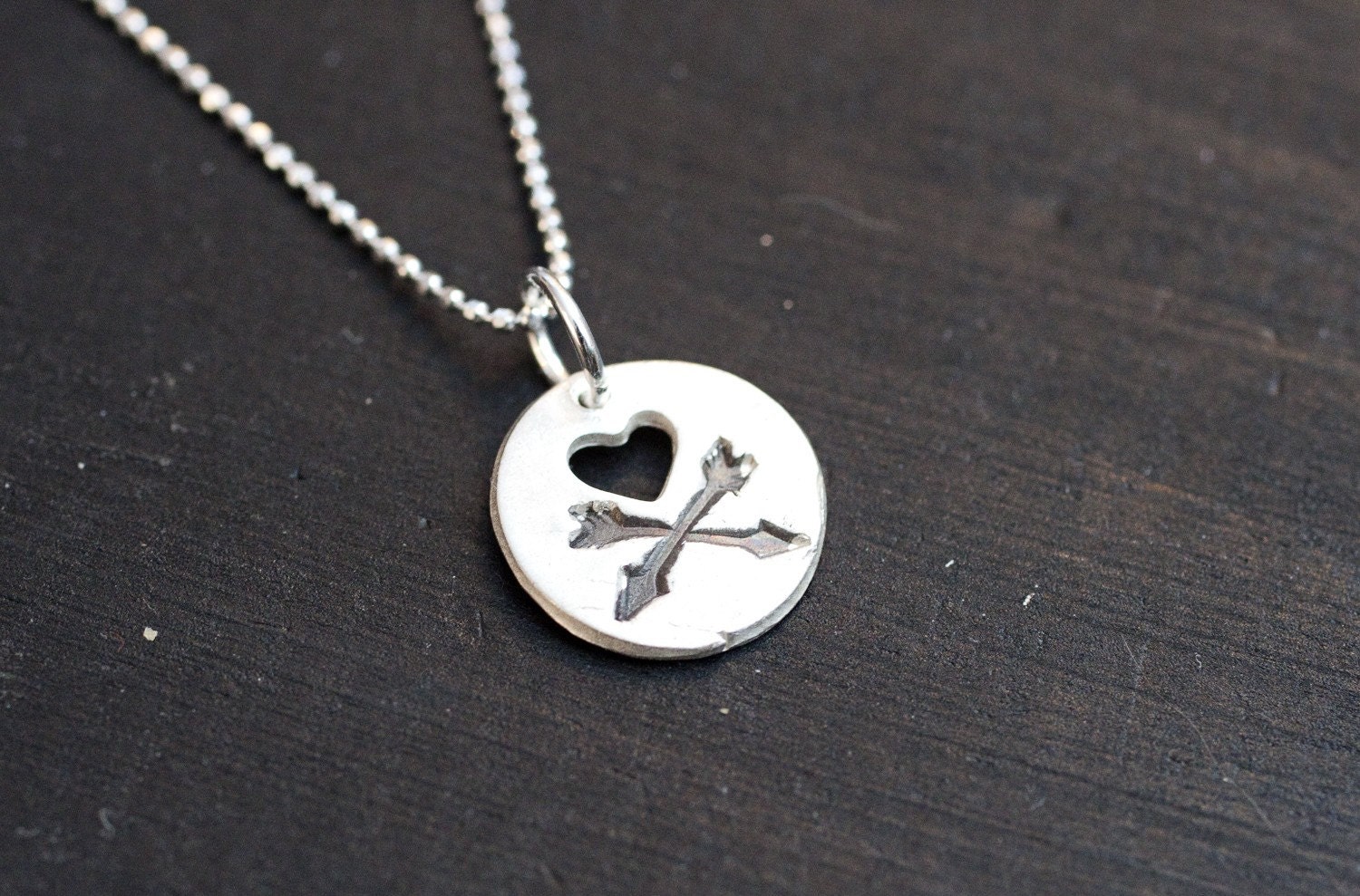 heart and cross arrows.