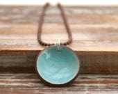 Enameled lucky penny pendant necklace on basemetal chain, Robins Egg.
