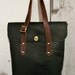 the Flux diplomat tote in brown and black