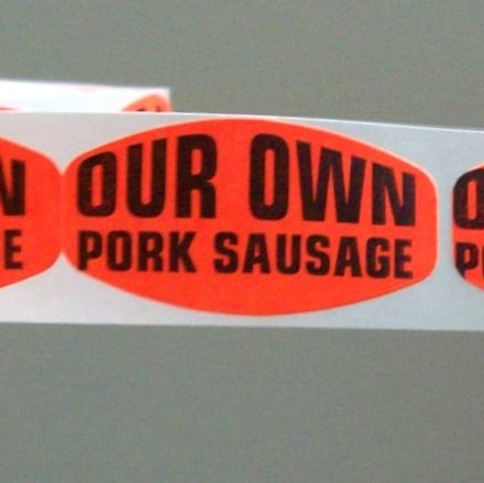 80 'our own pork sausage' stickers, so porky and sausagey