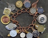 HANDMADE CHARM BRACELET...Coinage: A Charm Bracelet..handmade charms with many international coins..wear the world bank on your wrist.