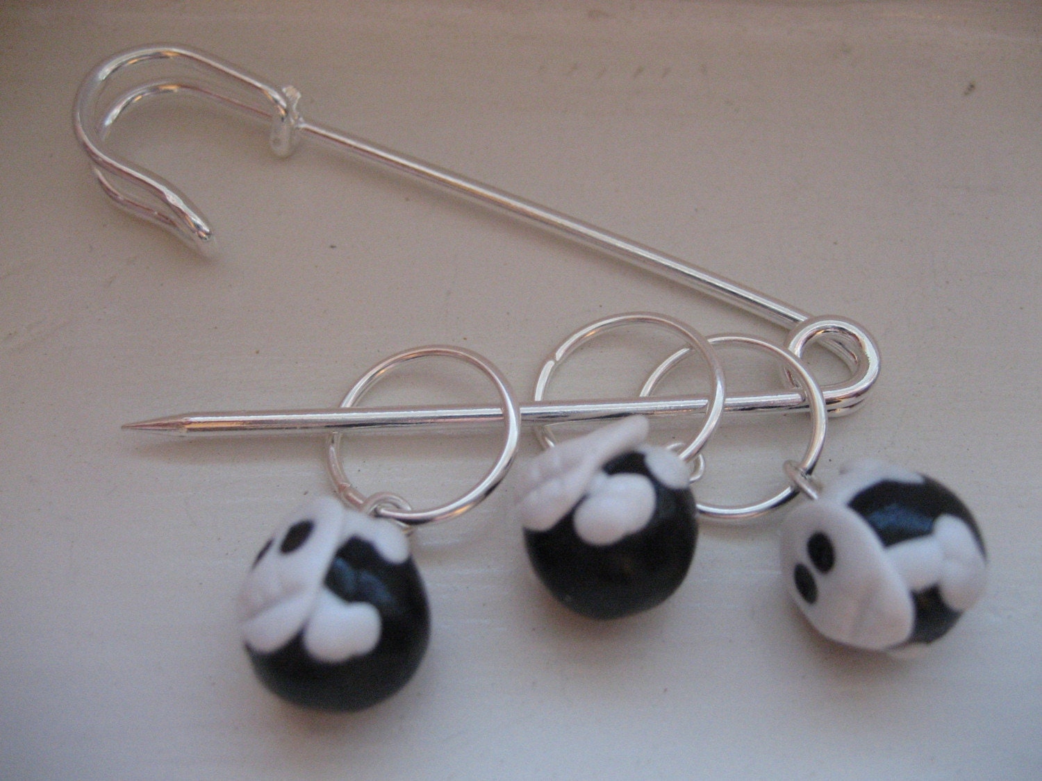 Skull and crossbones stitch marker set knit or crochet style black white