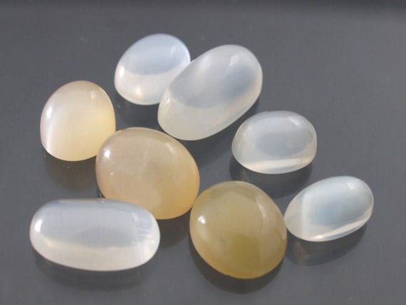 Reserved Wholesale lot of white or silver  moonstone only cabs in varied sizes - destashing my gem supply