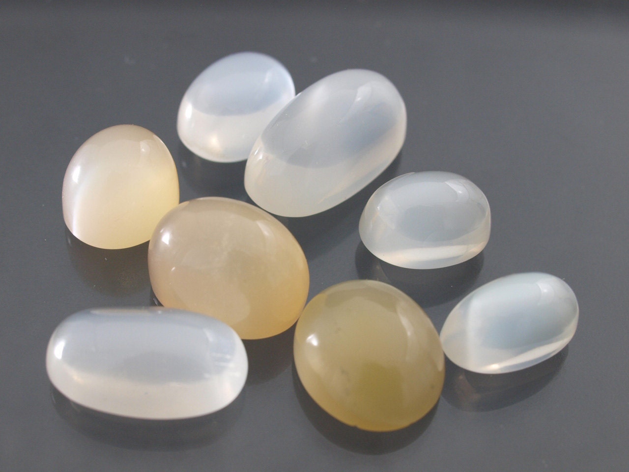Reserved Wholesale lot of white or silver  moonstone only cabs in varied sizes - destashing my gem supply