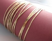 14 Thin Gold Hammered Bangles (for the price of 12)