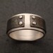 Mind The Gap: a ring in sterling silver and titanium