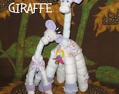 Instructions on how to make GIRAFFES from DIAPERS. Perfect baby keepsake gift centerpiece.On special now.