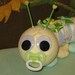 Learn to make a DIAPER CATERPILLAR from diapers and such. GR8 Baby Shower Gift.