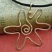 Spiral Sun Star Pendant Necklace - Brass Wire
