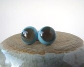 pale brown on pale blue round glass studs 9.5mm
