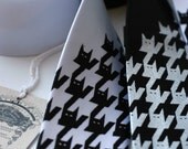 Catsooth (houndstooth) pattern silkscreened necktie