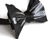Beer bow tie, black. Silkscreened hops barley, freestyle self-tie tie. Pale gray print.