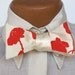 Poppy bow tie. Cream and dark coral freestyle & adjustable tie. Silkscreened floral necktie.