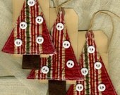 Three quilted tree gift tags or ornaments or package tie ons