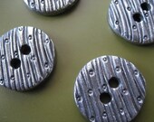 A Button Hiding- Single Handcast Pewter Button