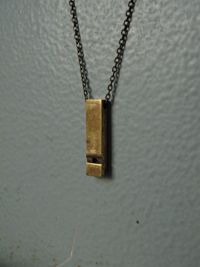 whistle statement necklace in brass on long minimal chain