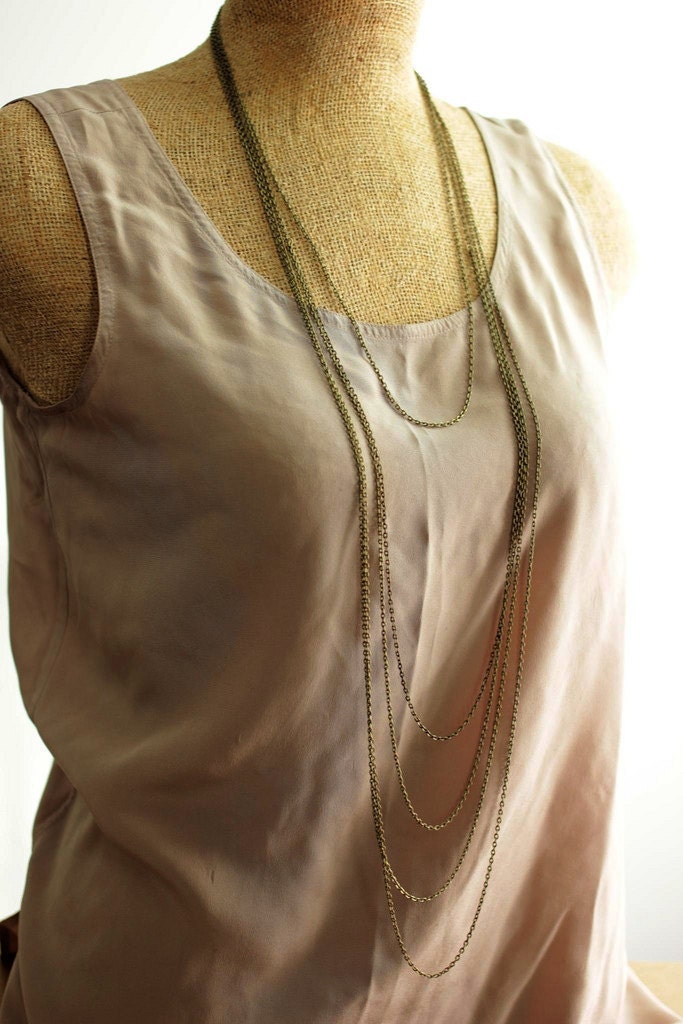 long minimal necklace with multi layered chains