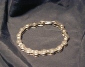 Bicycle Chain Bracelet also comes in blue, yellow, green, white, gold or purple