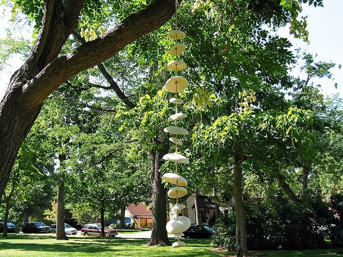 Mudpuppy Moon wind chimes organic hanging disc bells sculpture - natural buff stoneware