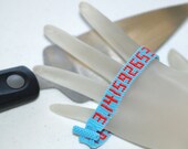 A Piece of Pi ... Bracelet . Geekery . Mathematics . Square Stitch . Narrow . Robins Egg Blue . Red . Numbers