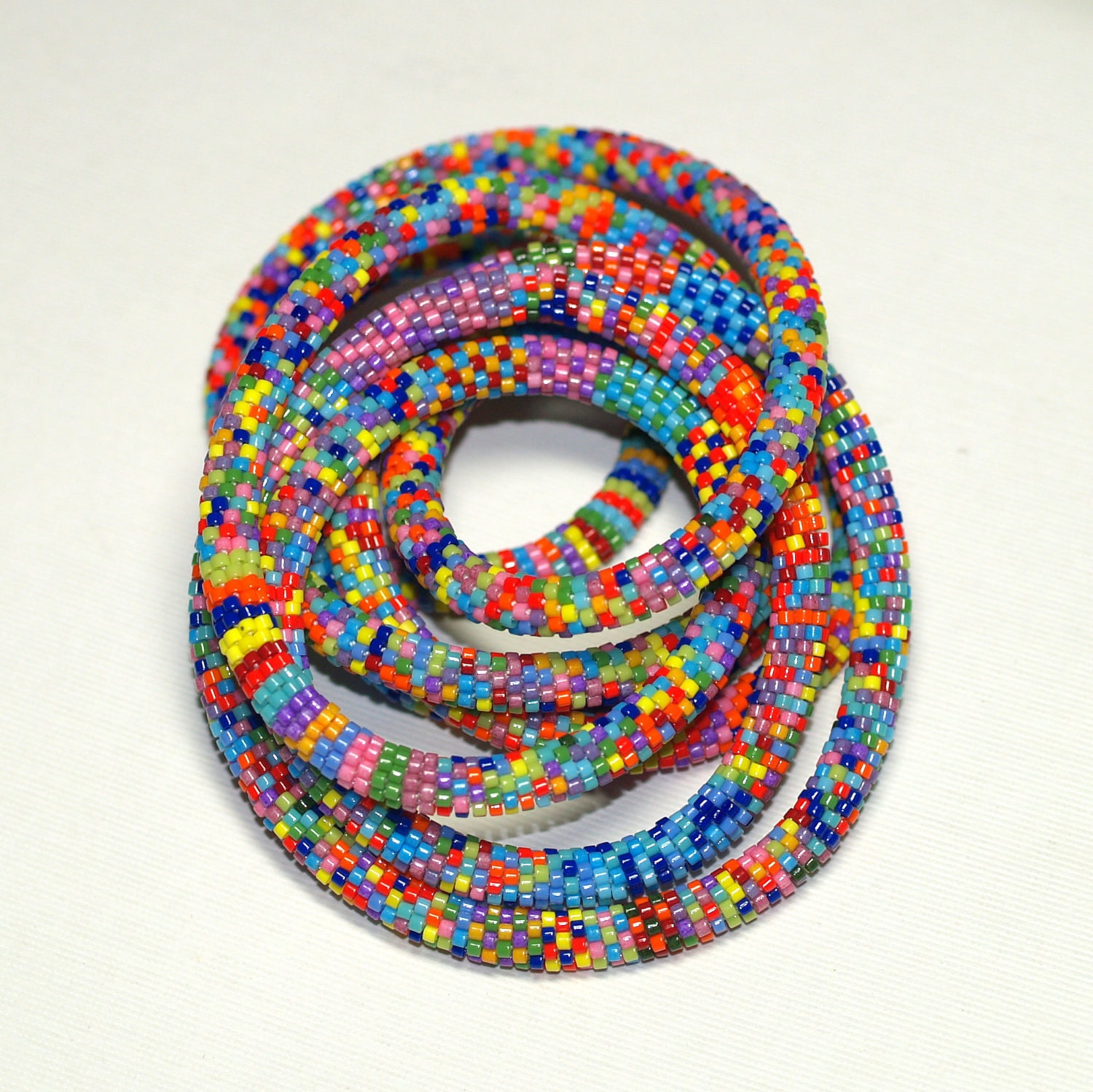 Zuri ... Bead Crochet Rope . Necklace . Bracelet . Multicolor . Colorful . Intricate . Patterned . Bold . Africa Inspired . Rainbow Colors