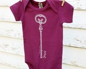 Organic berry onesie with ice blue skeleton key 12-18 Months