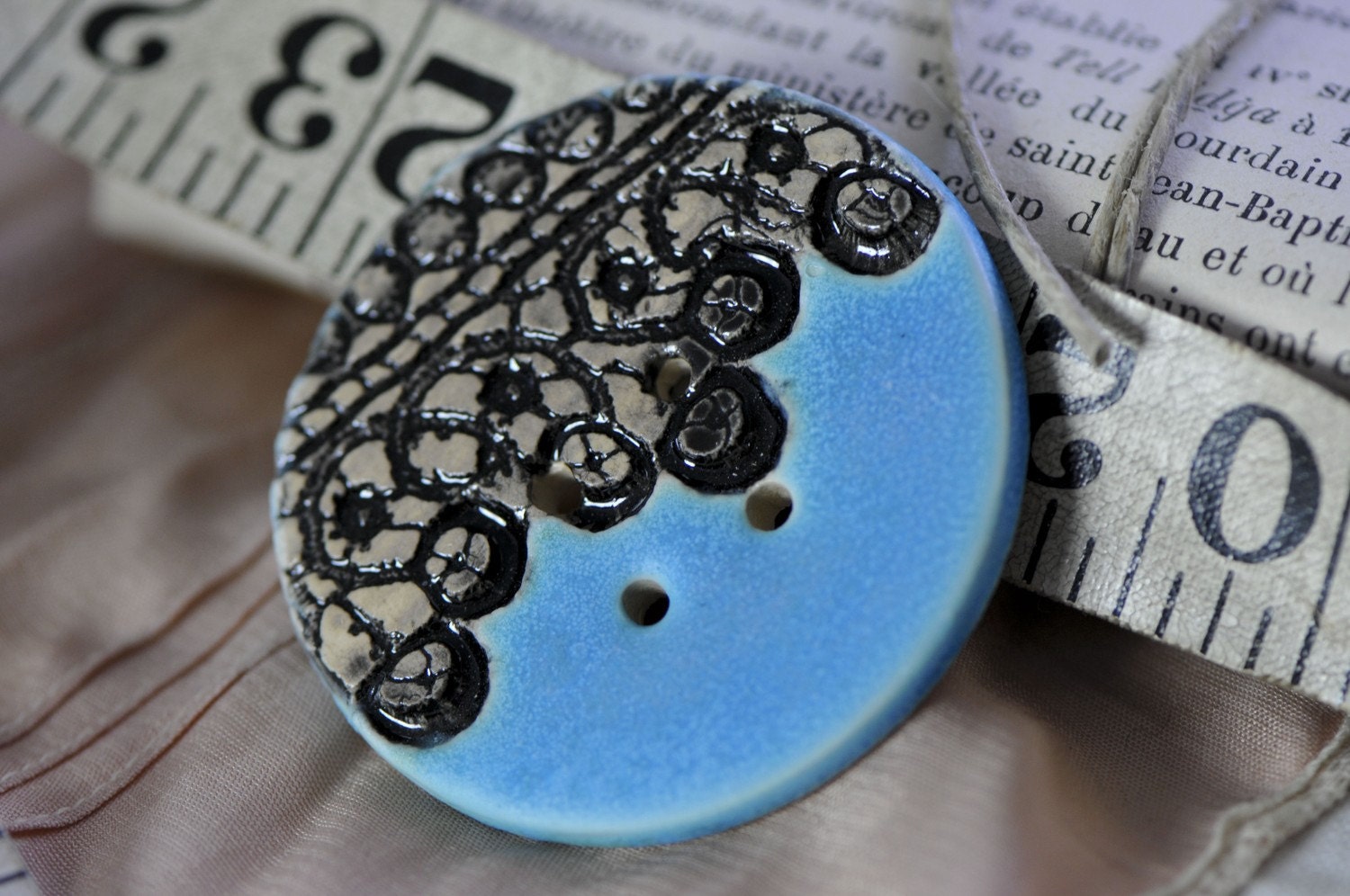 Sheila rose garden in black and silk turquoise...she is a sew on button