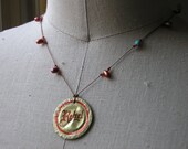 Rebel in copperness and turquoise.
