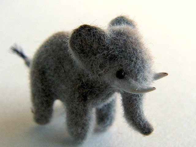 tiny miniature elephant figurine