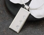 Sterling Silver and Flush Set 3mm Cubic Zirconias Contemporary Pendant Necklace
