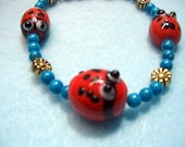 Lady Bug Bracelet, Turquoise Blue Howlite, Stone Beaded Jewelry, Golden Daisy Beads, Animal Charm Bracelet, Entomology Jewelry