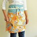 Apron  - flowers on apricot with blue band