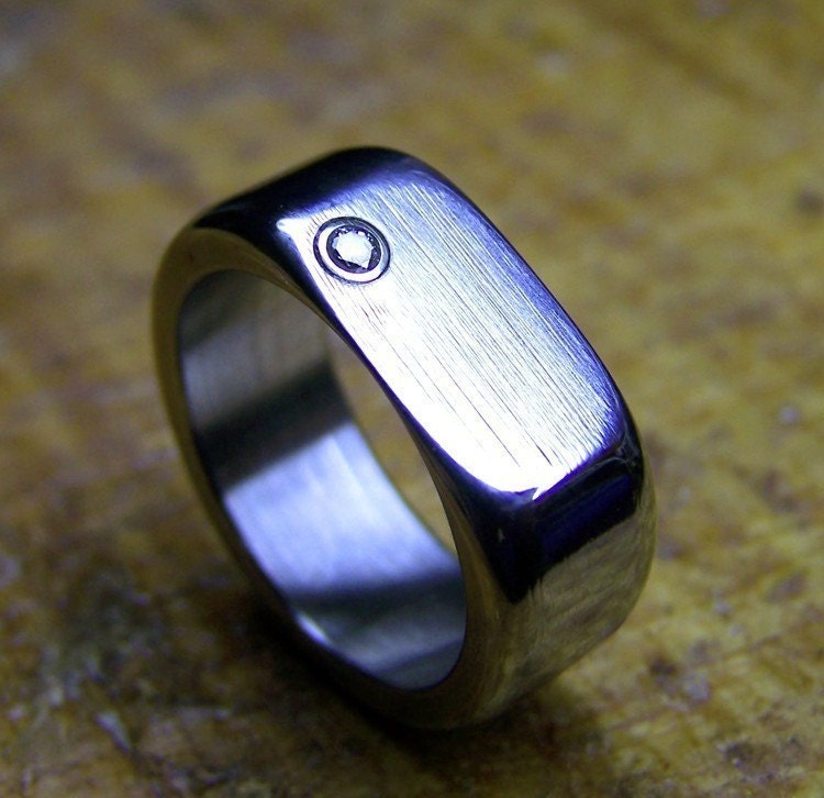 Size 7-Titanium and Diamond Ring (with gold bezel)