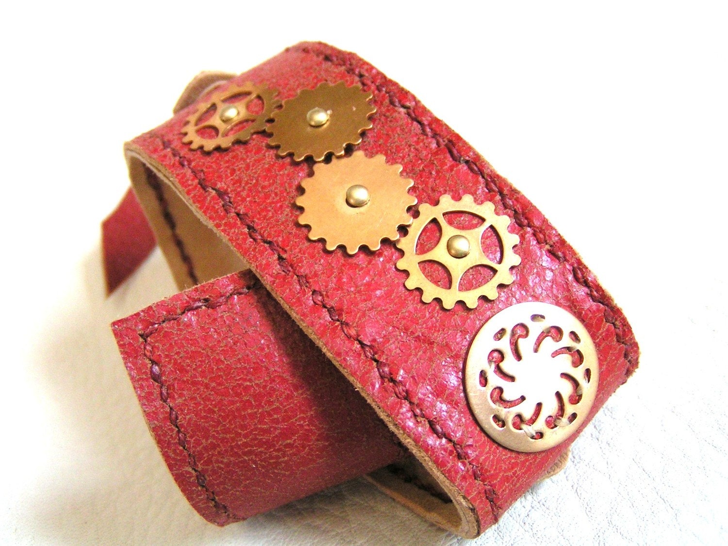 Spiral and gears leather cuff