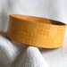 Yellow square interlace cuff
