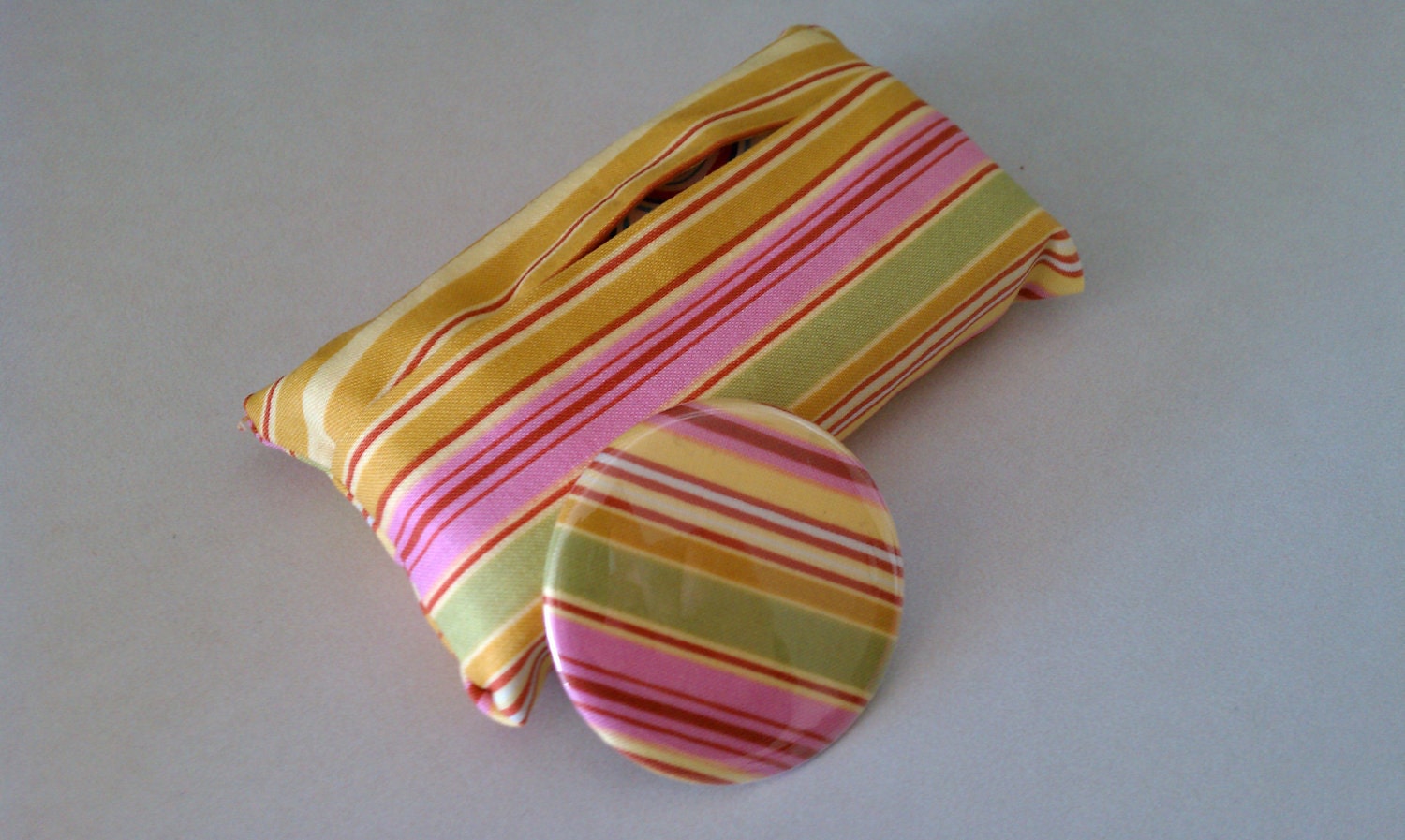 Matching tissue cozy and pocket mirror