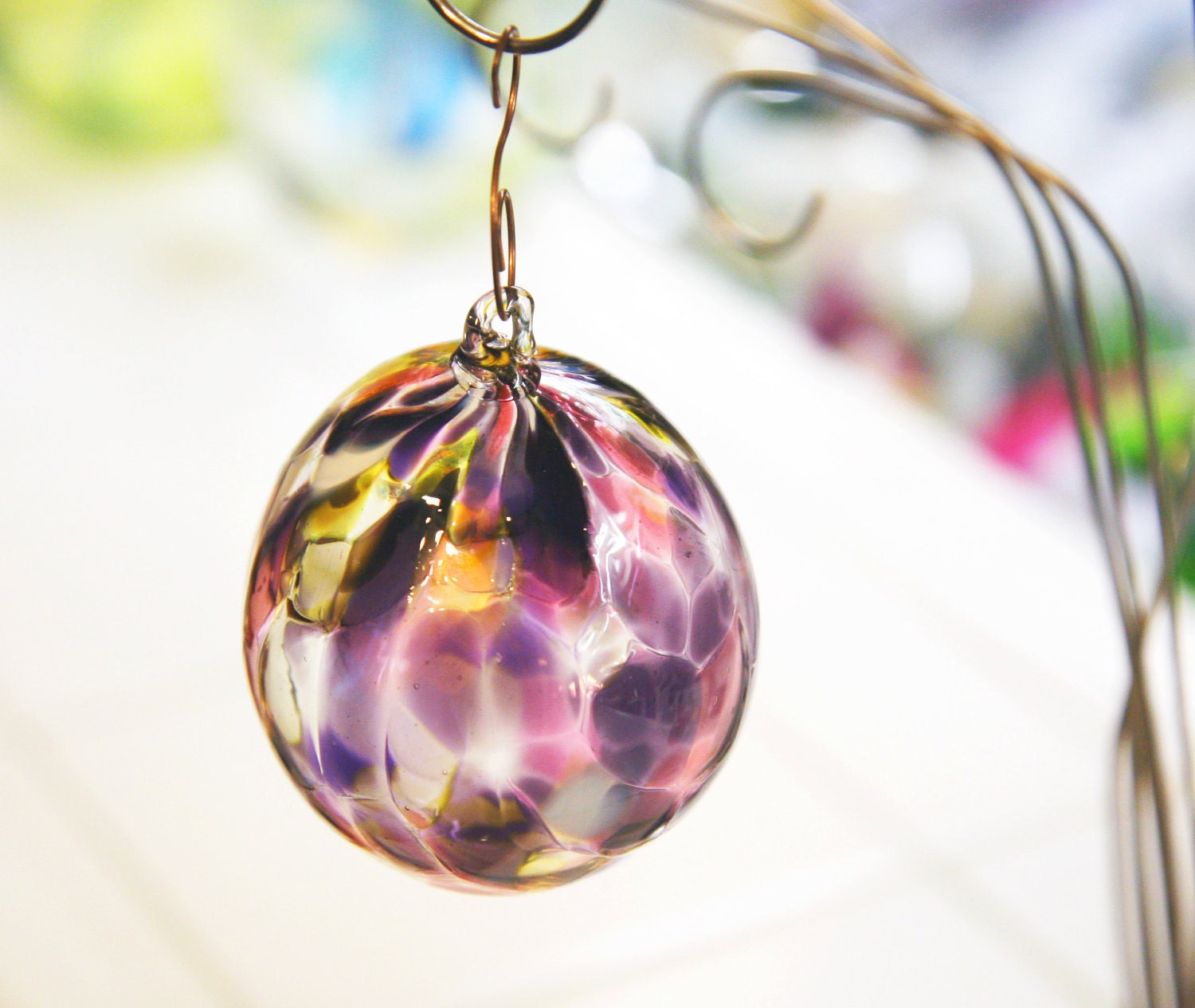 Handblown ruby, purple and gold glass ornament