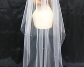 Moonlight is a Swarovski Crystal Rhinestone 36 Inch Long Fingertip Length Veil