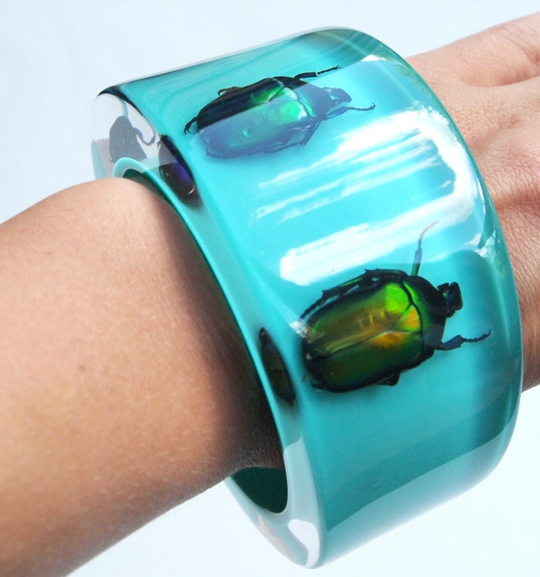 Blue lucite bracelet with real beetles