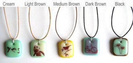 Crown on Aqua. A fused glass pendant necklace.