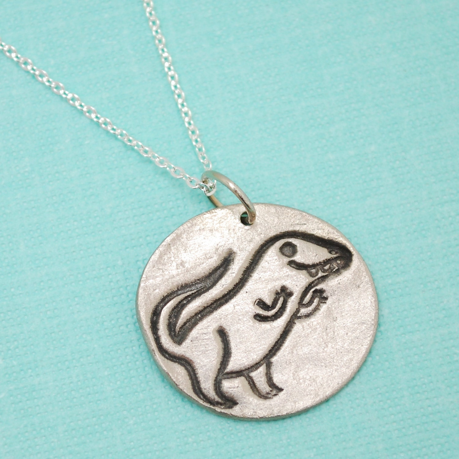 TYRANNOSAURUS REX necklace, nickel-free white bronze pendant, artwork by BOYGIRLPARTY. Handcrafted by Chocolate and Steel