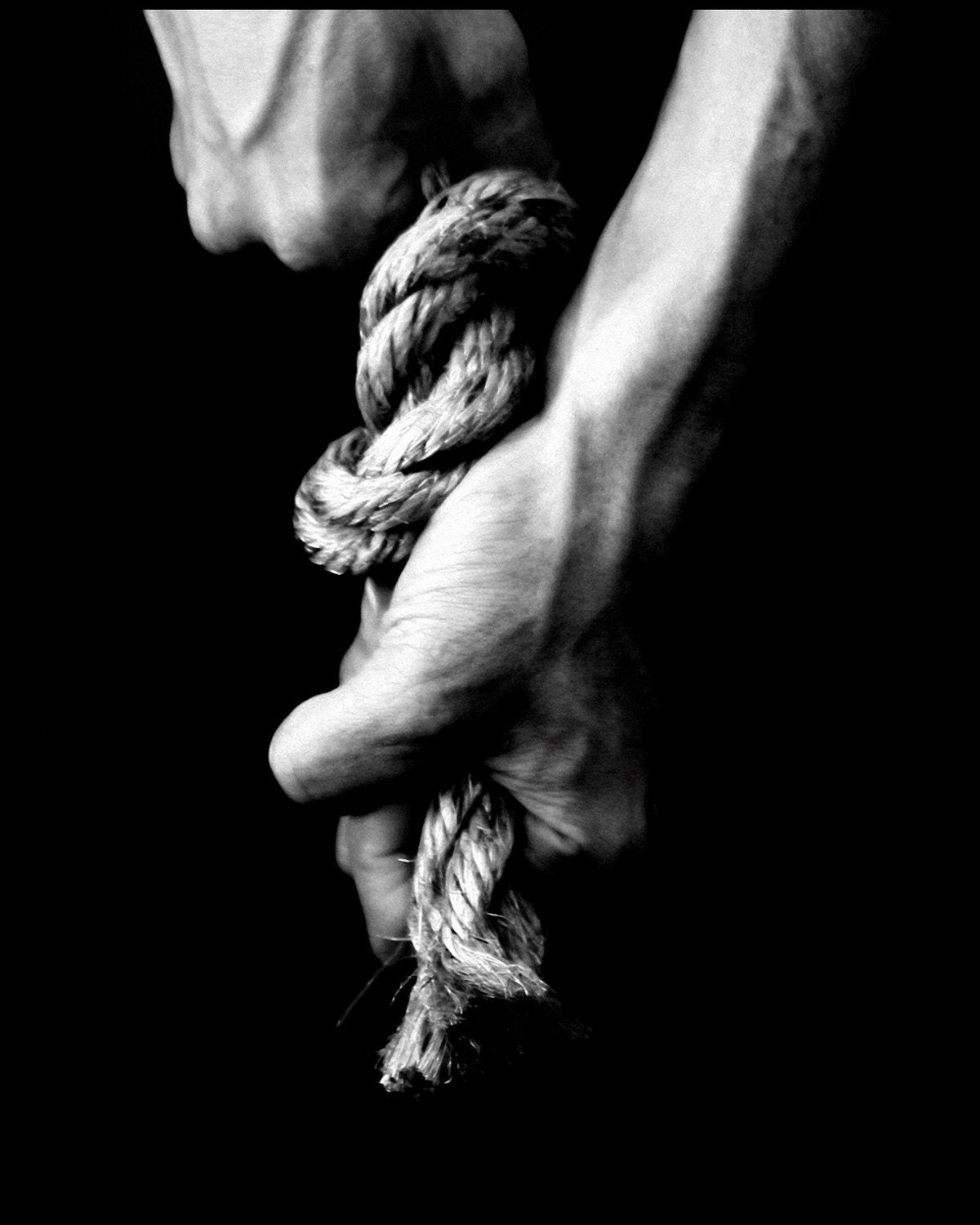 black and white photograph, fine art photography conceptual photography, female hands, rope, woman