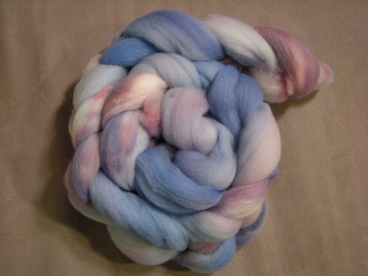 Blue with bits of Purple and Pink Hand Dyed Merino Roving - 4oz.