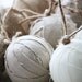 Set of 9 Rag Ball Trio. Handmade Christmas ornaments in linen and burlap.