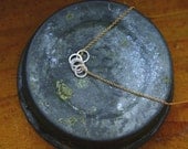 5 ring necklace.