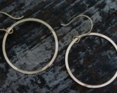 large open circle earrings.
