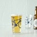 2 bicycle pint glasses, blue bike